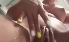 Horny blonde woman fingers her twat in the bathroom after getting ready to have oral sex.