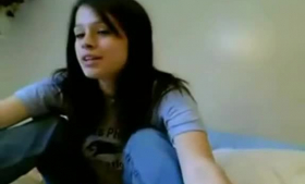 Beautiful dark haired blonde is giving a footjob to a guy who suddenly showed up.