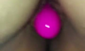 Corrina is using a vibrator to gently rub her hairy pussy and say sweet nari.