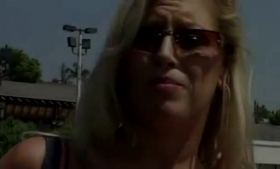 Sensual blonde milf with big, firm tits is getting fucked in the back of a carsizing