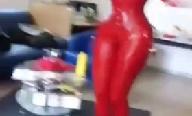 A latex bodywax diva giving a blowjob before getting hammered