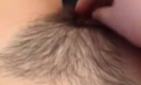 Short haired lady who likes cocks more than anything else is giving a handjob exam.